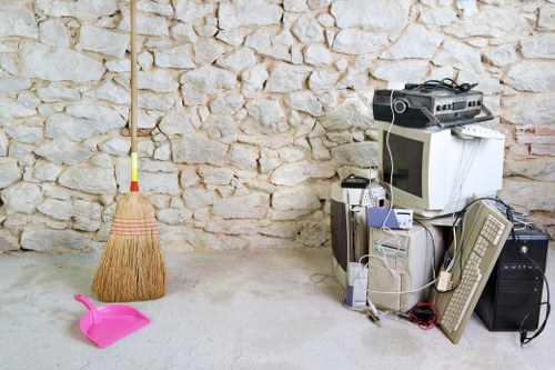 Clean and organized garage space after clearance in Clapham